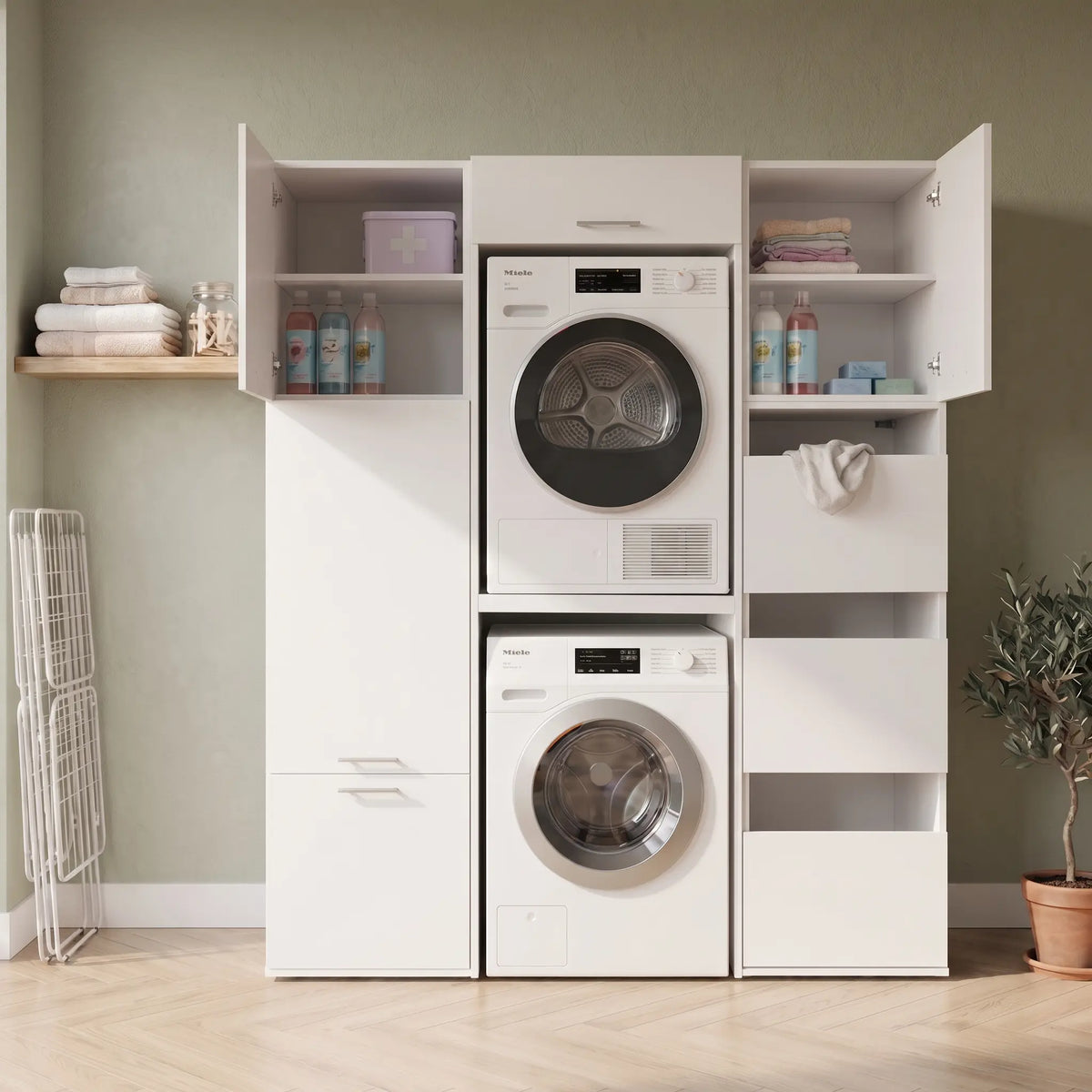 White stacked washer and dryer with round glass doors, built into white cabinetry with open shelves.